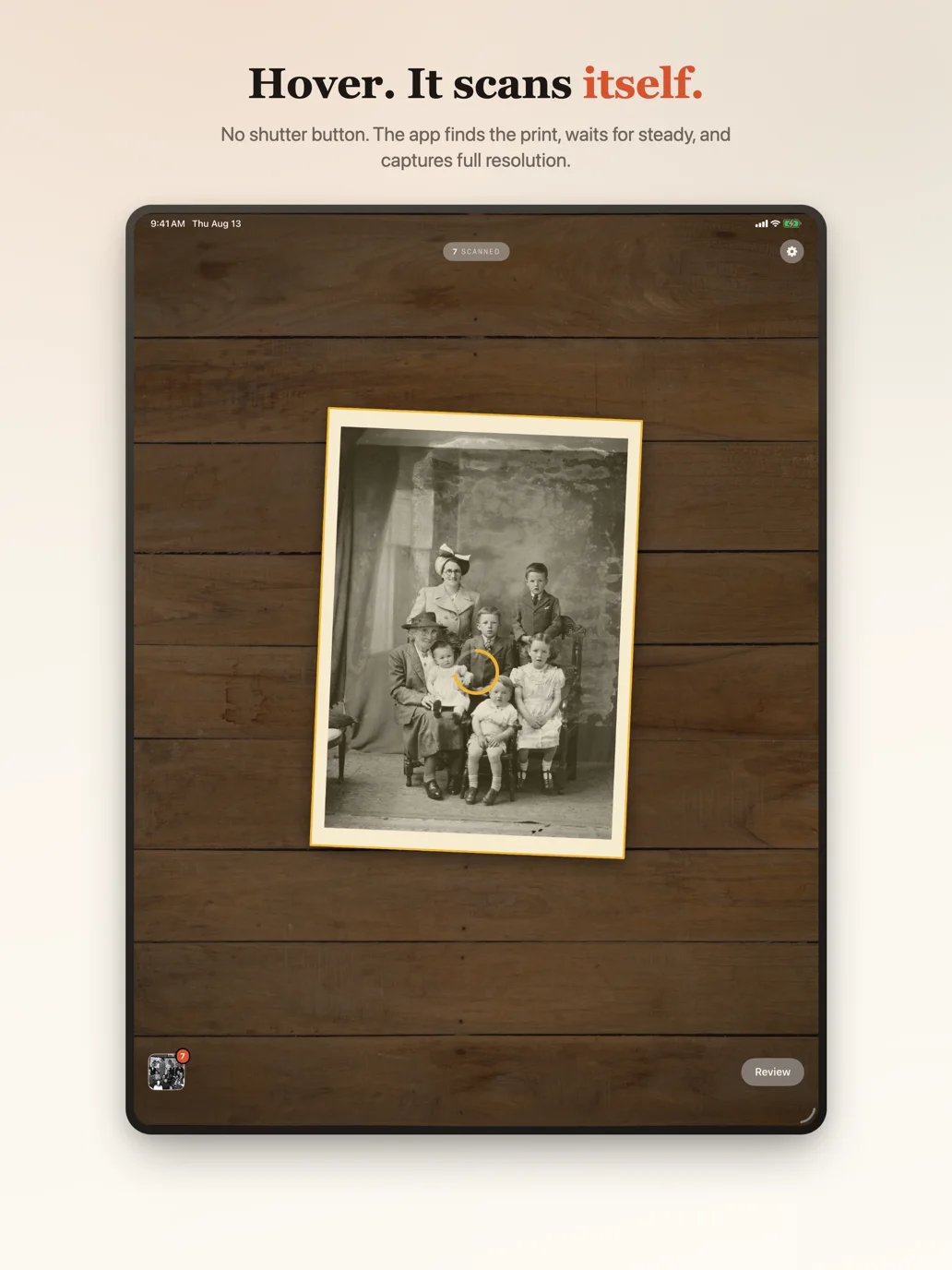 iPad scan: hover over a print on a wood table, locked edges and stability ring